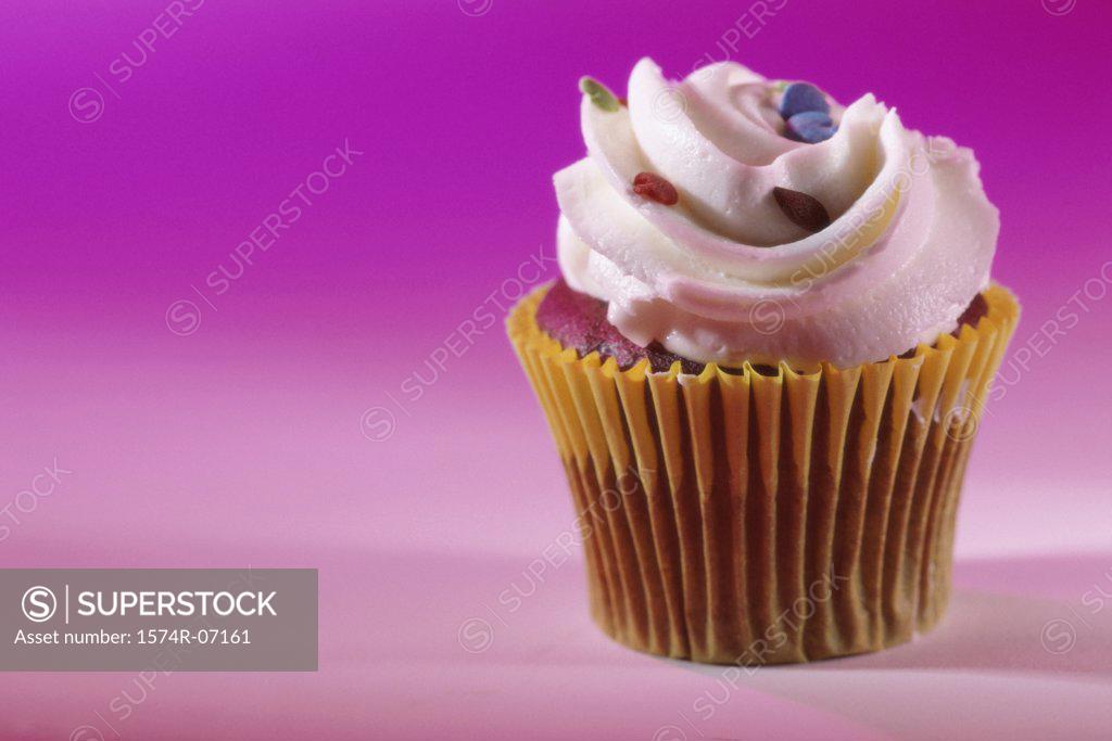 Stock Photo: 1574R-07161 Cupcake with vanilla frosting