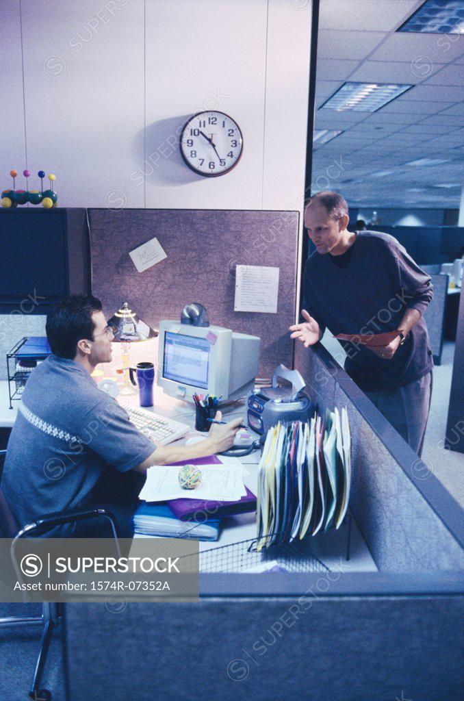 Stock Photo: 1574R-07352A Two businessmen in an office