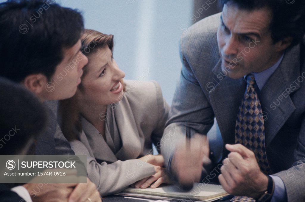 Stock Photo: 1574R-0926 Business executives having a discussion