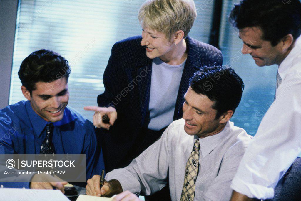 Stock Photo: 1574R-0929 Business executives in a meeting