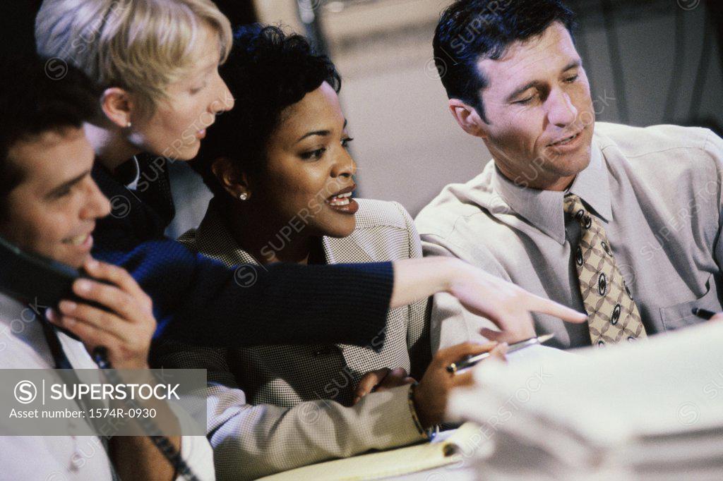 Stock Photo: 1574R-0930 Business executives in a meeting