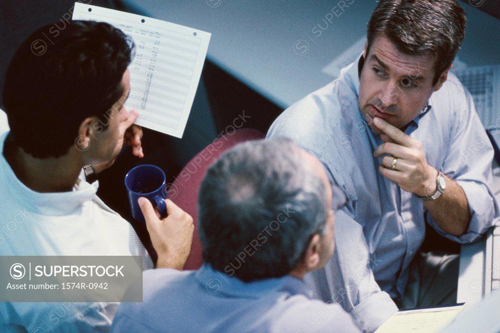 Stock Photo: 1574R-0942 High angle view of businessmen in a meeting