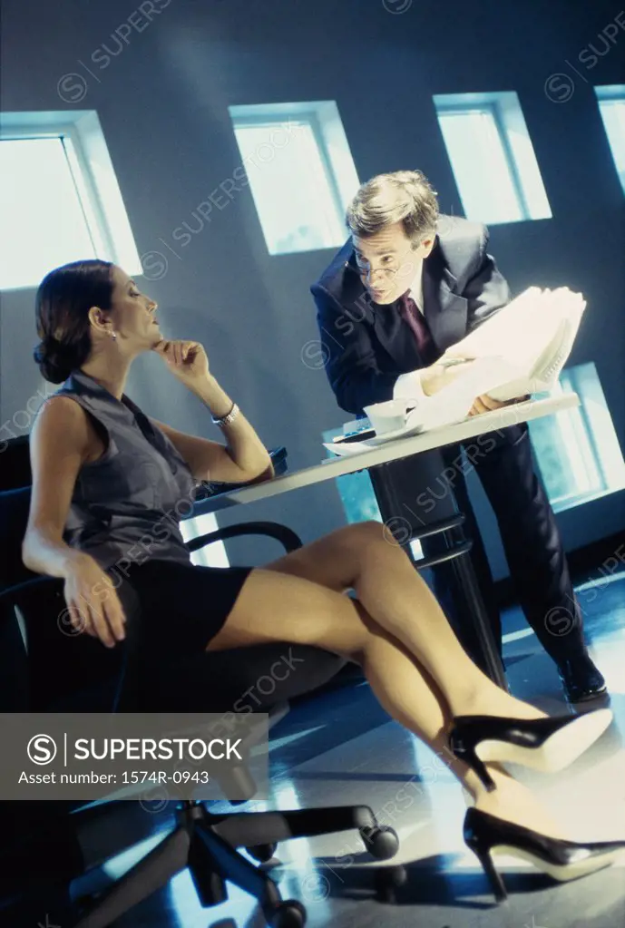 Businessman and businesswoman in a meeting