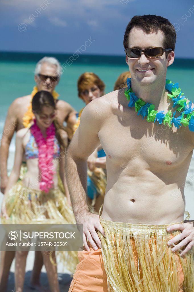 Stock Photo: 1574R-20589 Close-up of a young man smiling on the beach