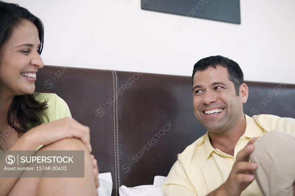 Stock Photo: 1574R-20633 Close-up of a mature couple looking at each other and smiling