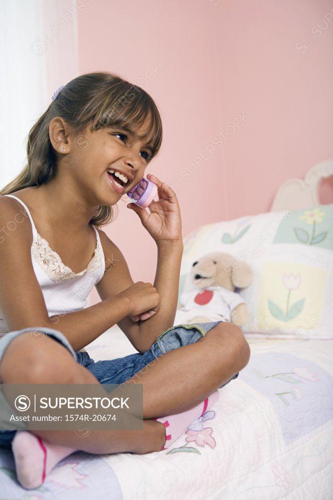 Stock Photo: 1574R-20674 Close-up of a girl talking on a mobile phone