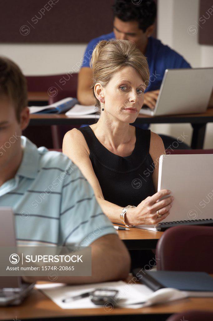 Stock Photo: 1574R-20865 Mid adult woman peeking during an examination