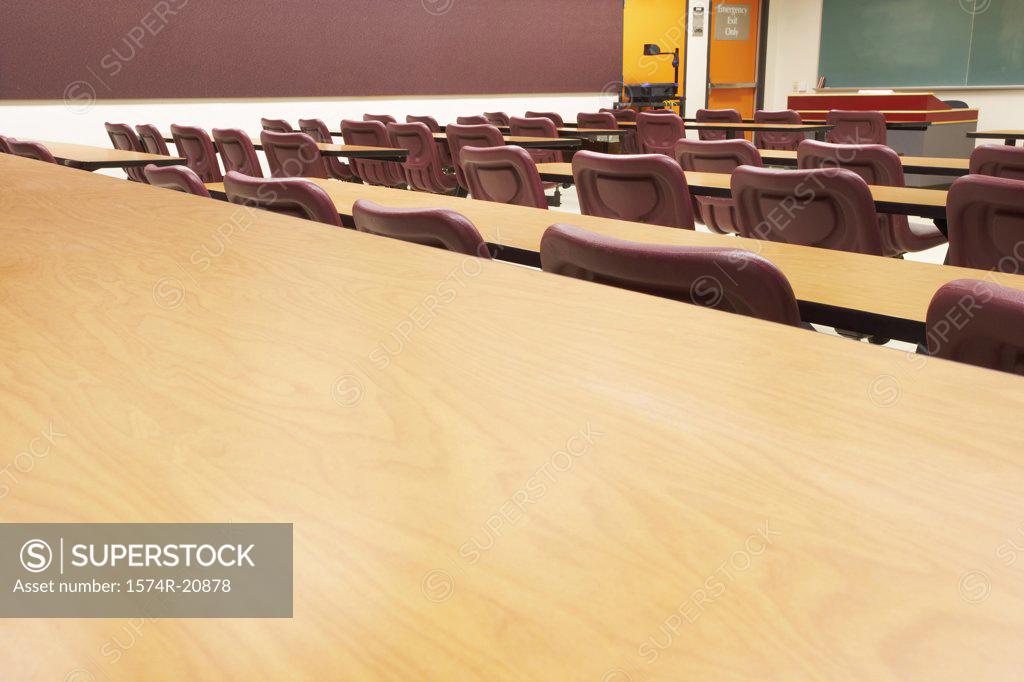 Stock Photo: 1574R-20878 Empty tables and chairs in a lecture hall