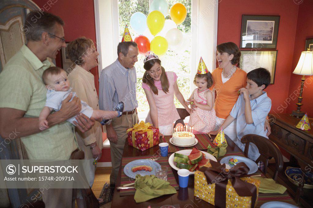 Stock Photo: 1574R-20971A Family at a birthday party