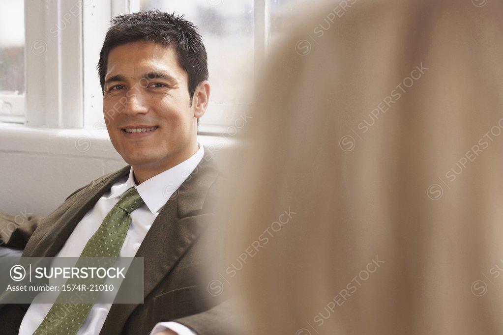 Stock Photo: 1574R-21010 Portrait of a businessman smiling