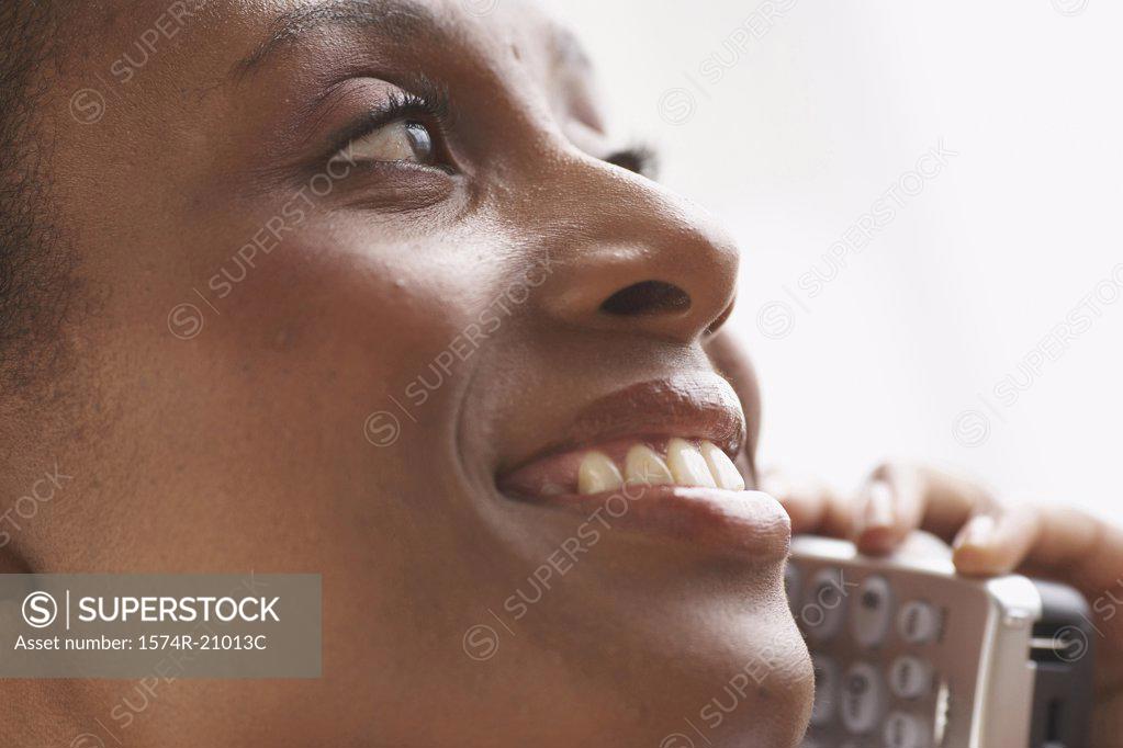 Stock Photo: 1574R-21013C Close-up of a businesswoman talking on the phone