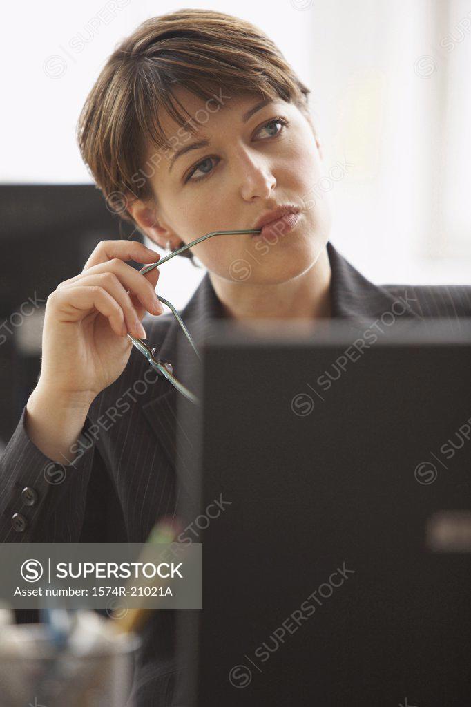 Stock Photo: 1574R-21021A Close-up of a businesswoman looking serious