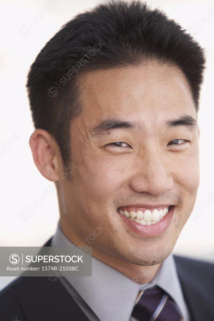 Stock Photo: 1574R-21038C Portrait of a businessman smiling