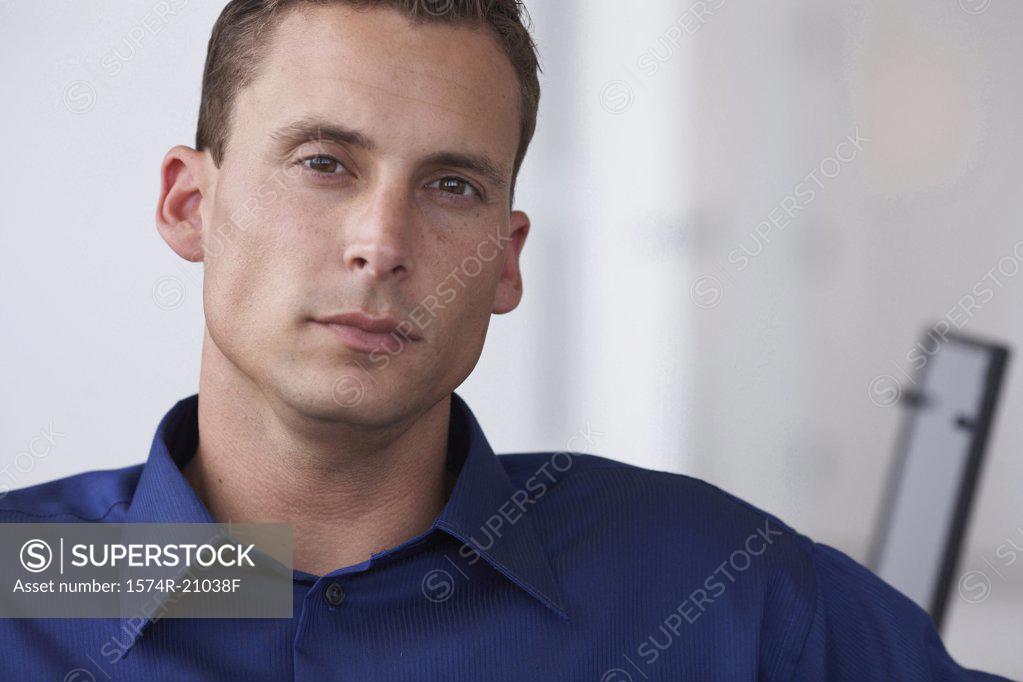 Stock Photo: 1574R-21038F Portrait of a businessman in an office