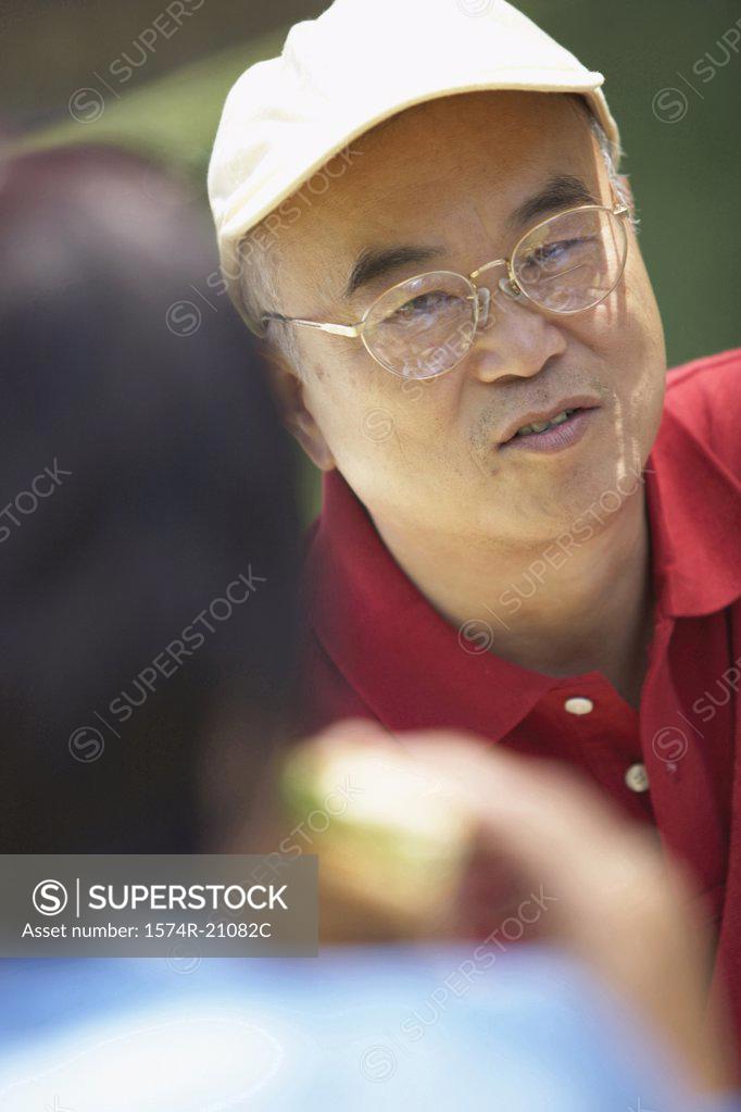 Stock Photo: 1574R-21082C Close-up of a mature man looking at a mature woman