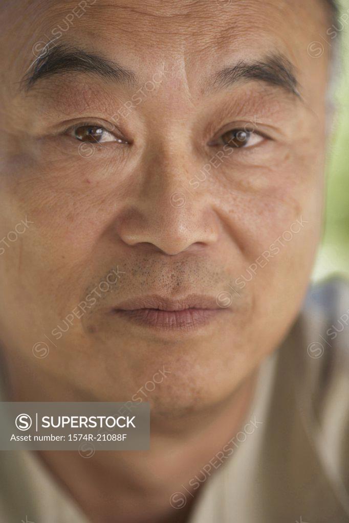 Stock Photo: 1574R-21088F Portrait of a mature man looking serious