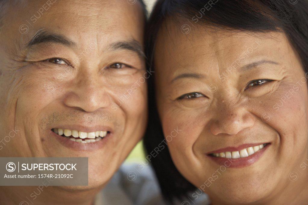 Stock Photo: 1574R-21092C Portrait of a mature couple smiling