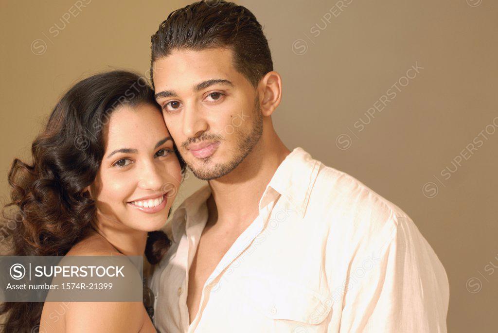Stock Photo: 1574R-21399 Close-up of a young couple smiling