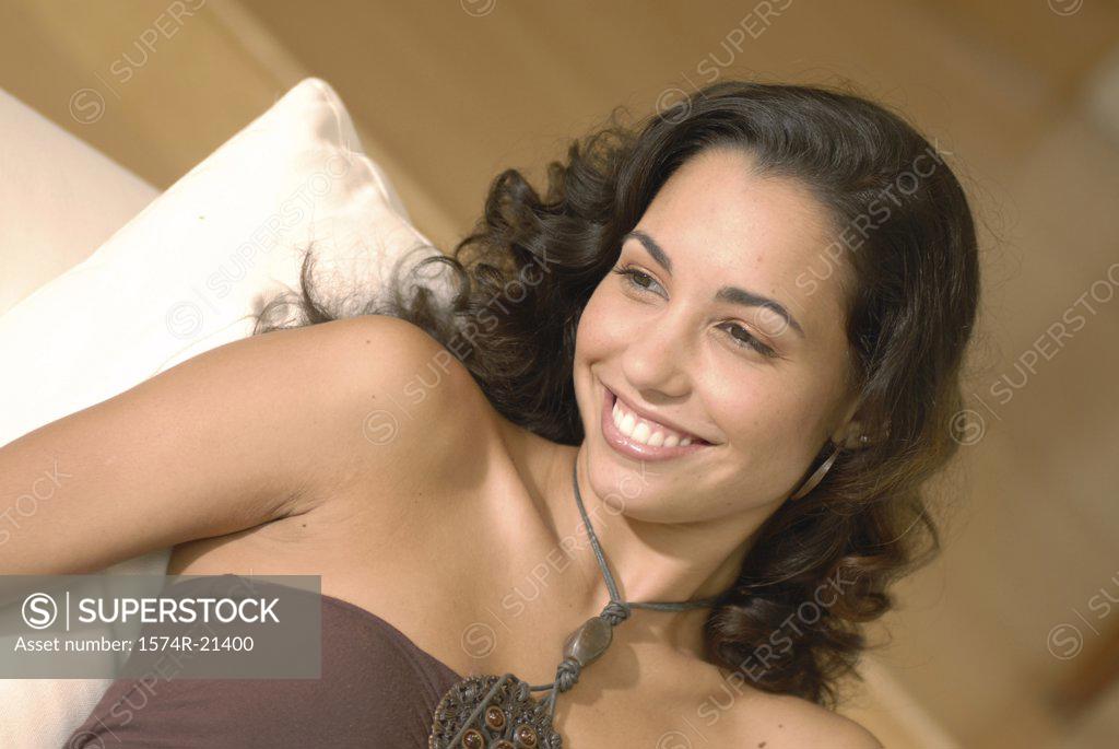 Stock Photo: 1574R-21400 Close-up of a young woman smiling