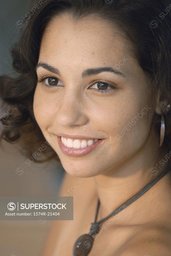 Stock Photo: 1574R-21404 Close-up of a young woman smiling
