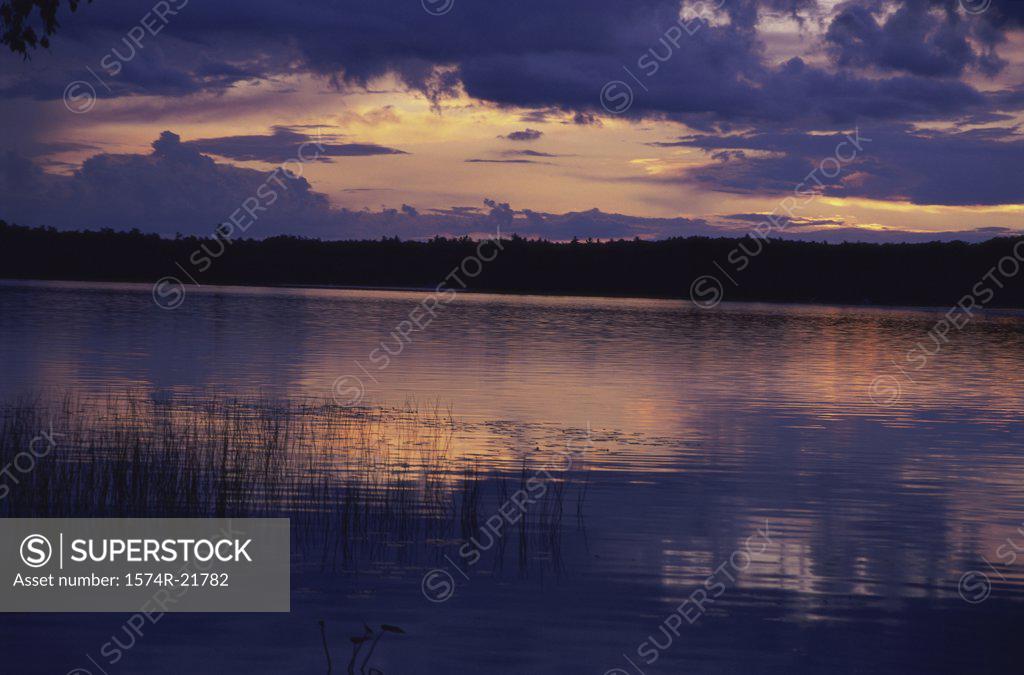 Stock Photo: 1574R-21782 Sunset over a lake