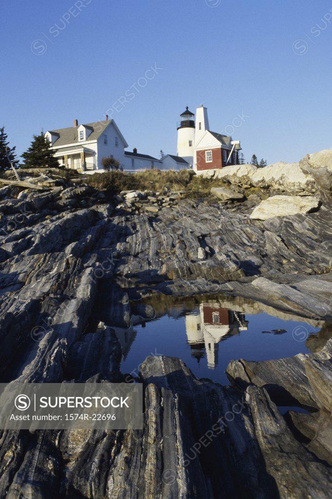 Stock Photo: 1574R-22696 Reflection of a lighthouse in water, Pemaquid Point Lighthouse, Pemaquid Point, Maine, USA