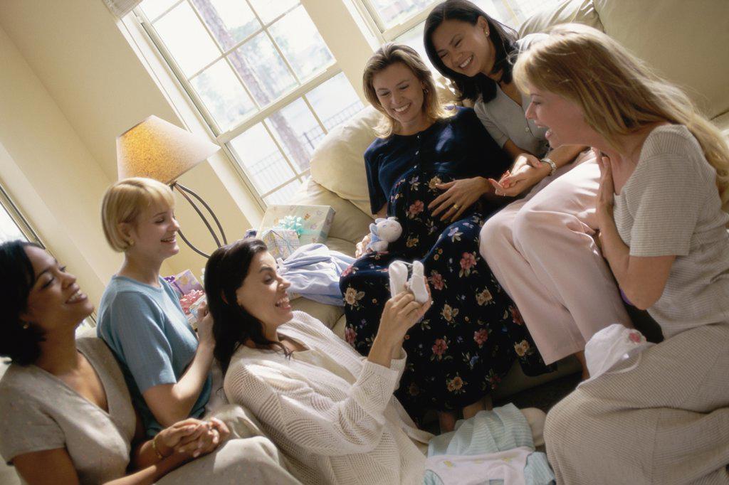 Group of young women sitting together at a baby shower