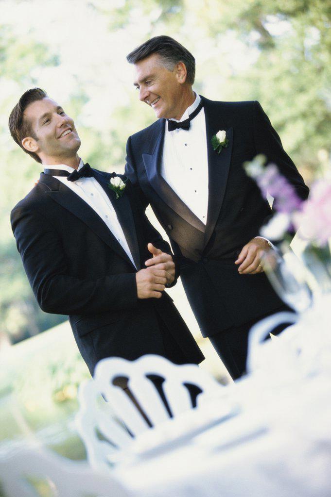 Newlywed young man with his father