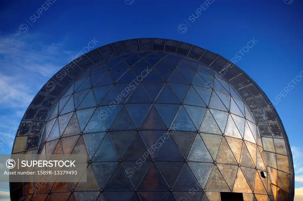 Metal observatory under blue sky