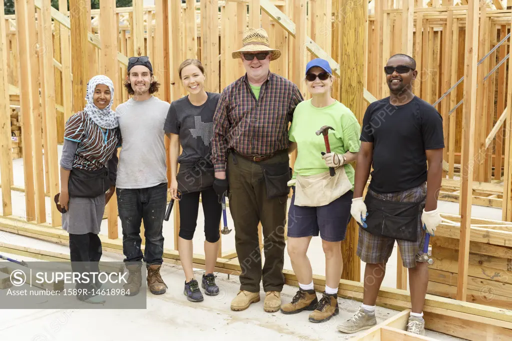 Volunteers posing at construction site