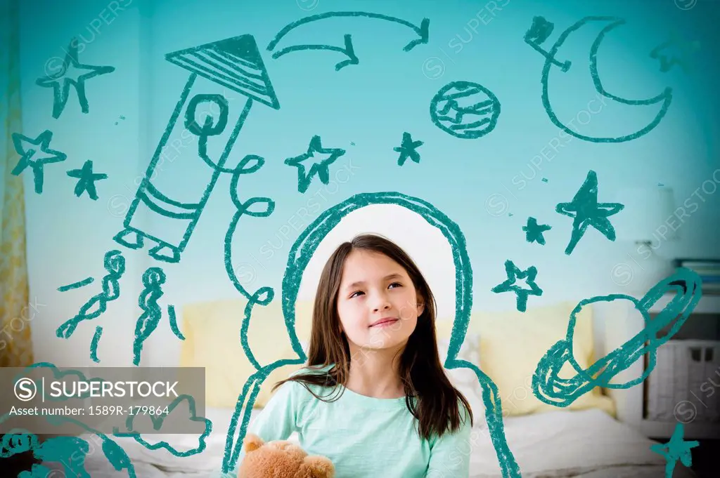 Mixed race girl with space doodles surrounding head