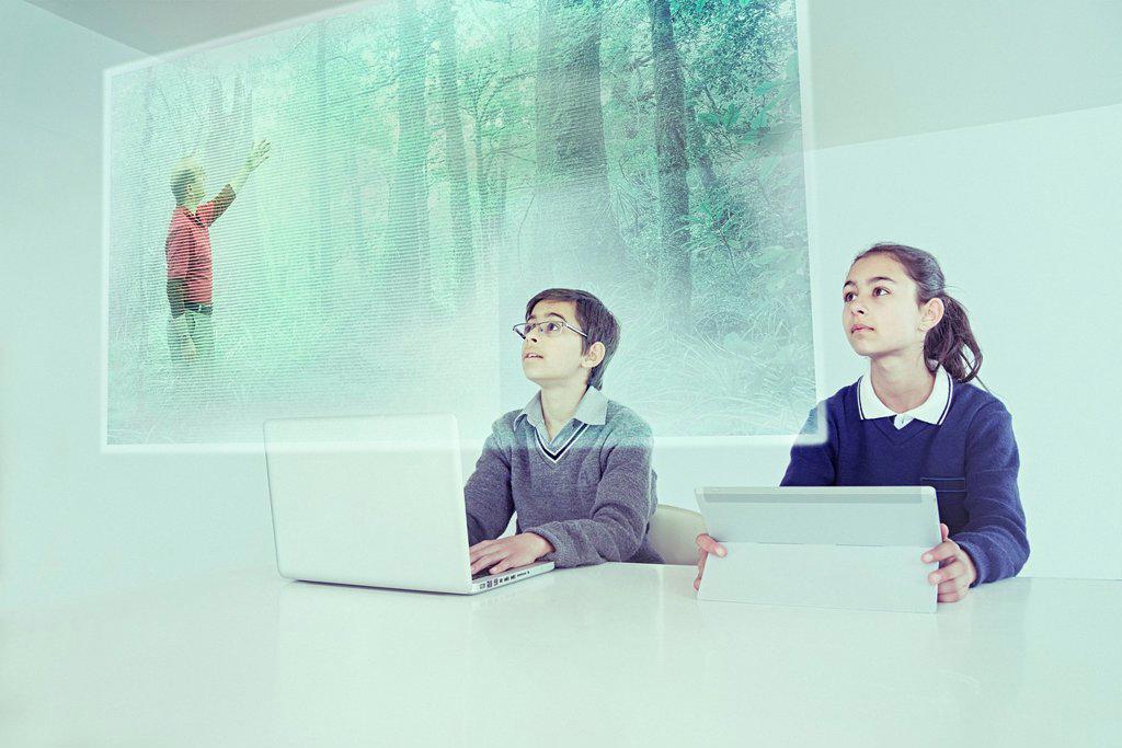 Children watching floating screen in online class