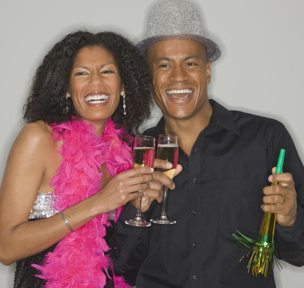 African couple drinking champagne