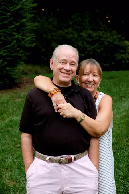 Portrait of smiling Caucasian couple outdoors