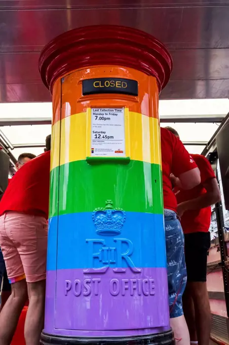 England, London, The Annual Pride Festival, Royal Mail Parade Participants Float Featuring Postbox Painted with Pride Colours