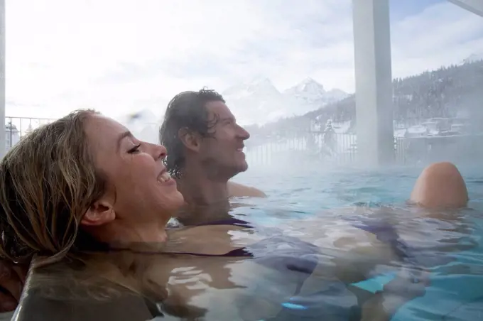 couple in indoor swimming pool OVAVERVA in Saint Moritz,