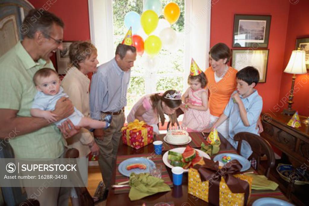 Stock Photo: 1628R-345B Family at a birthday party
