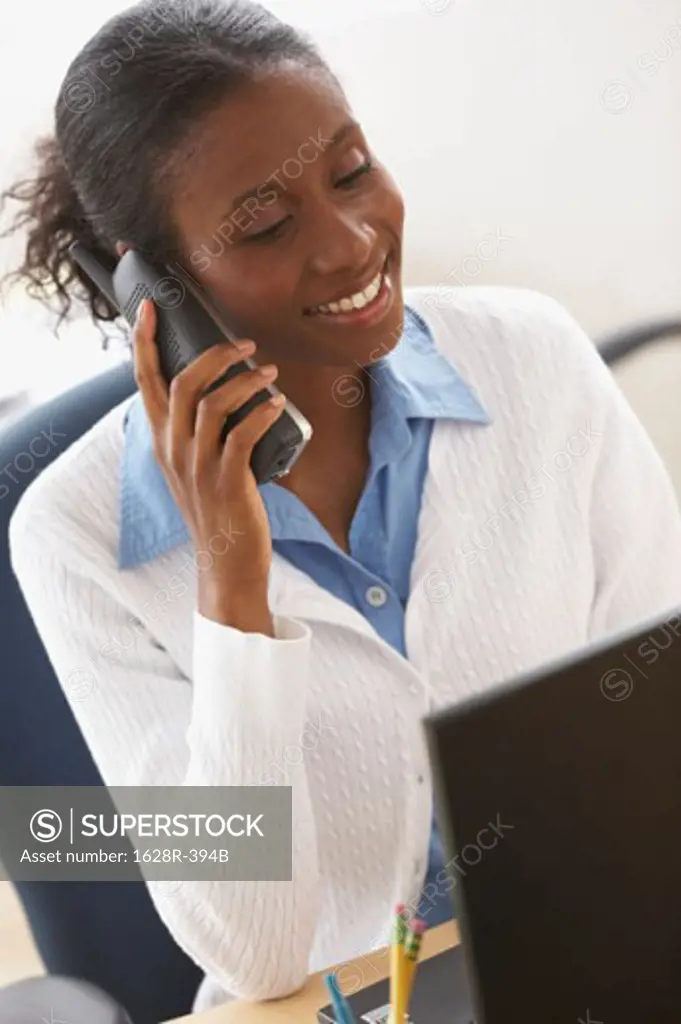 Close-up of a businesswoman talking on the phone