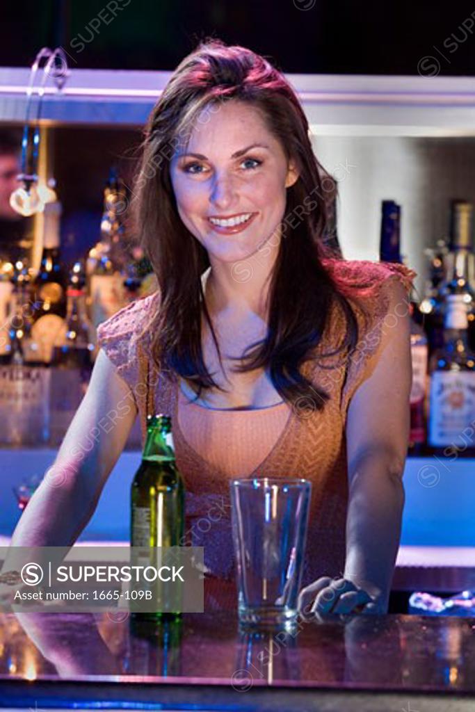 Stock Photo: 1665-109B Portrait of a female bartender smiling