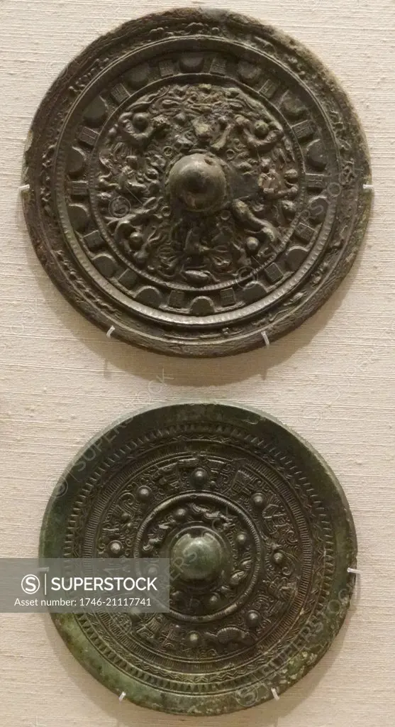 Bronze mirrors from a tomb in Chikuzen province China;250-710 AD