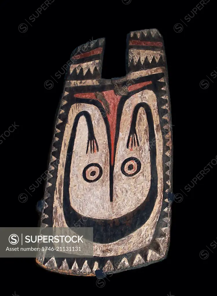 Tribal art: Decorated wooden board from the South Pacific. Displayed in ceremonies by the Elema people from Gulf of Papua, New Guinea.
