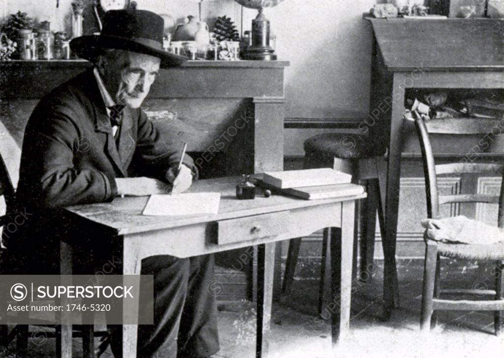 Stock Photo: 1746-5320 Jean-Henri Fabre (1823-1915) French entomologist at the little table in his study at Serignan.