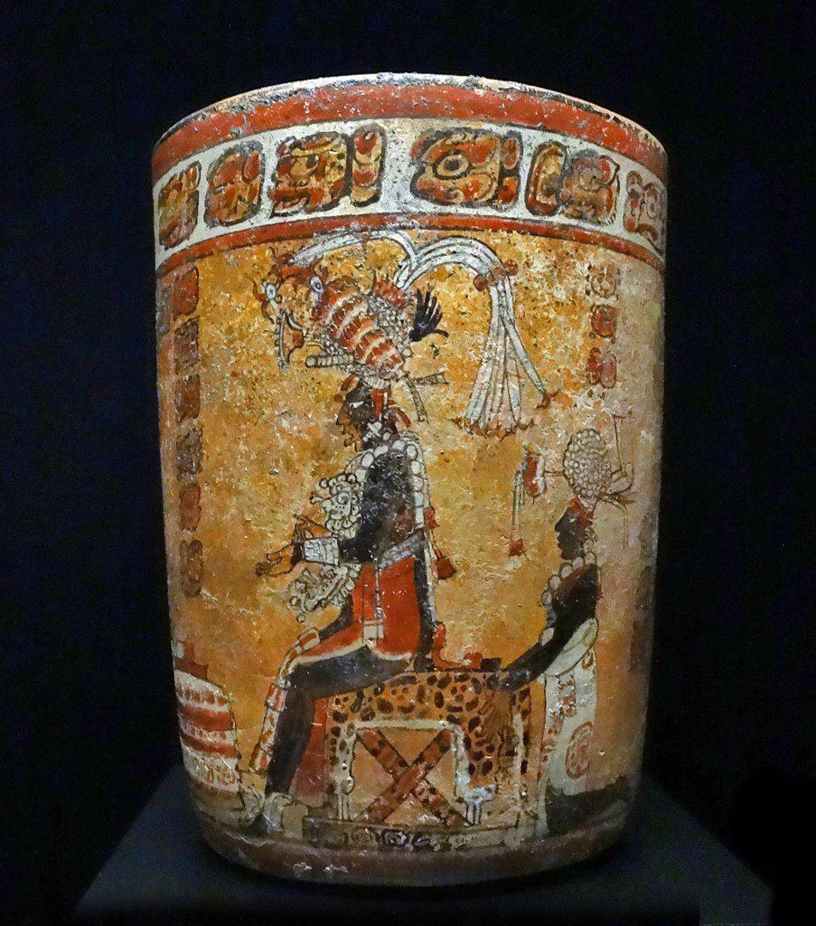Mayan terracotta vase depicting a king or ruler on a throne covered by a jaguar skin. From Peten, Yucatan, Mexico. 600-900 AD