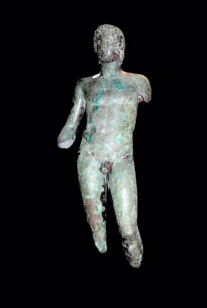 Bronze statue of a young man In ancient Greece and Rome. Roman version of an earlier Greek statue. It is made of polished bronze. The eyes are silvered and the irises and pupils would have been of glass or semi-precious stone. 1st century BC, from Ziphteh, (Tell Atrib) in the Nile Delta, Egypt
