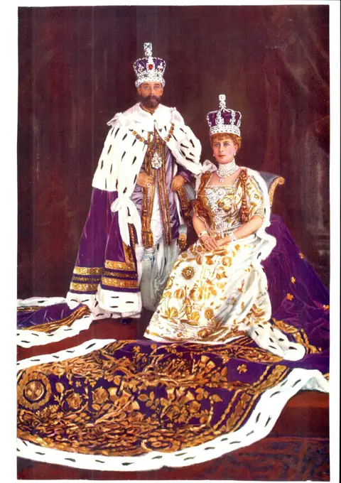 George V, King of Great Britain 1910-1936, with his consort Queen Mary, in coronation robes, 1911.