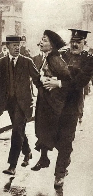 Mrs. Emmeline Pankhurst (1857-1928), English Suffragette, being arrested outside Buckingham Palace, London 1914