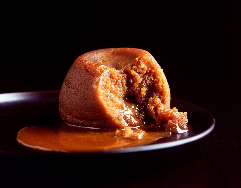 Sticky toffee pudding oozing sauce