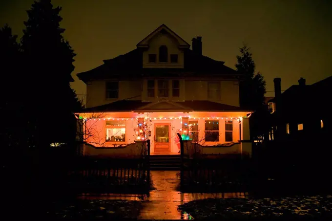 Christmas lights on house at night