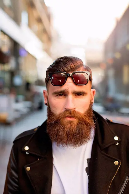 Portrait of bearded young man with sunglasses