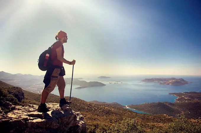 Male Hiker Overlooking The View From Mountain At Antalya Turkey